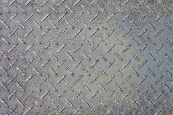 Roestige metalen achtergrond met antislip repetitieve patroon — Stockfoto
