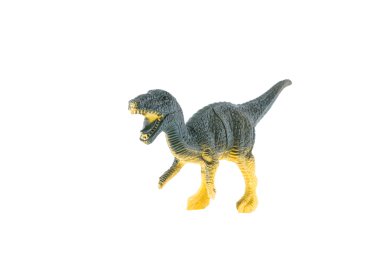 Beyaz arka planda izole edilmiş plastik dinozor oyuncağı