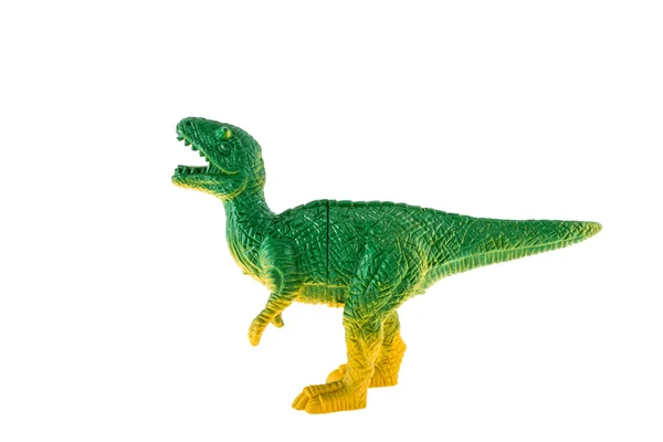 Пластиковая игрушка динозавра на белом фоне — стоковое фото
