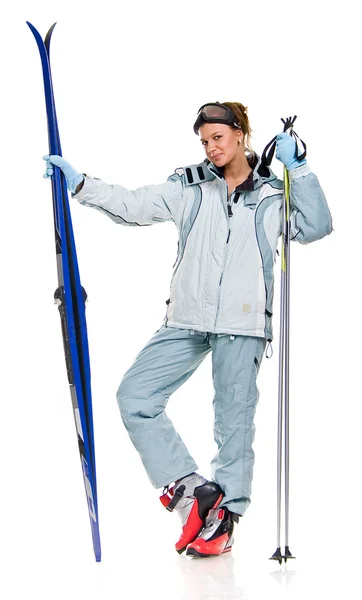 Winter sexy girl in grey sports suit and with skis — Stock Photo, Image