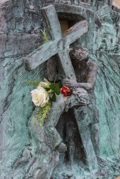 Bass relief of Christ falling under the cross. — Stock Photo, Image