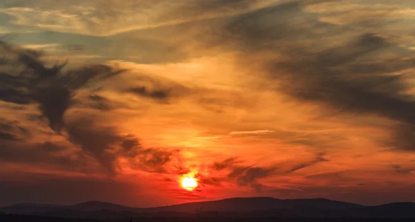 Muti-colored clouds at sunset — Stock Photo, Image