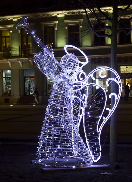 Christmas street decorations - angel playing the trumpet made of — Stock Photo, Image