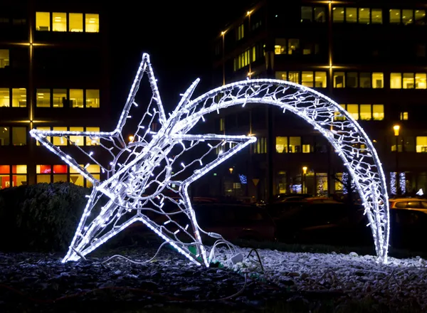 Shiny christmas street decoration in the shape of a comet made o — Stock Photo, Image