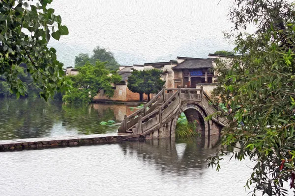 Famoso puente de piedra que conduce a la antigua aldea de Hongcun en Anhui Imagen de stock