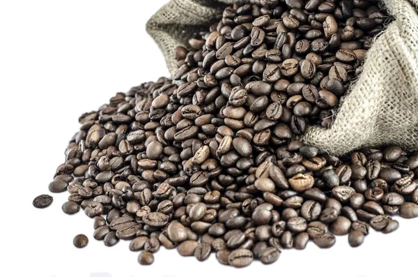 Wool bag full with coffee beans — Stock Photo, Image