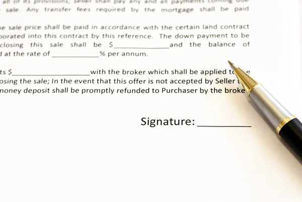 Document with signature and pen — Stock Photo, Image