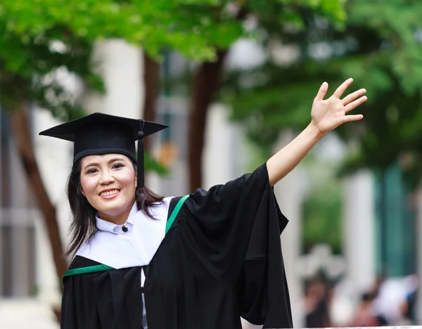 Graduation asian girls with congratulation — Stock Photo, Image