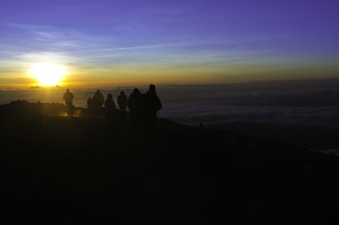 Trekkers on Kilimanjaro at Sunrise clipart