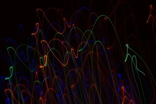 Sokszínű Neon Fények Fekete Háttér — Stock Fotó