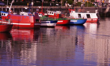 Colorful boats in the port of Coruña