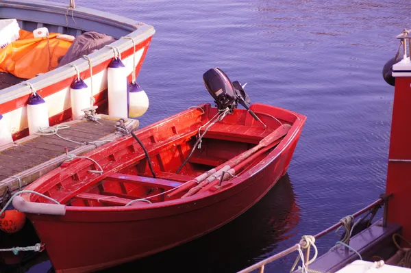 Red painted boat in the port of Coruña — Stok fotoğraf