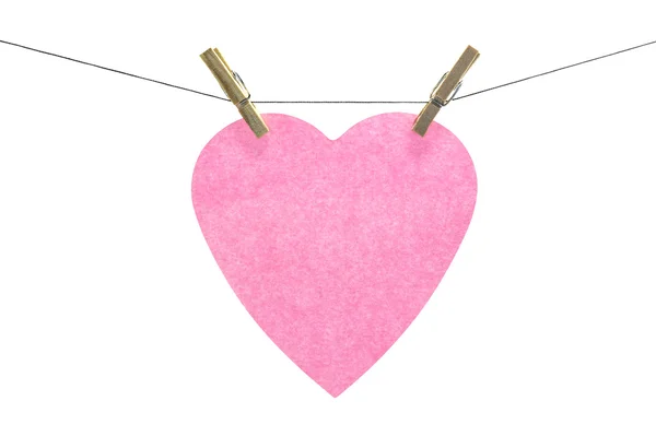 Corazón plano de color rosa pegajoso nota colgada, aislado sobre fondo blanco Fotos de stock