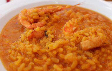 soup rice dish with seafood in a restaurant