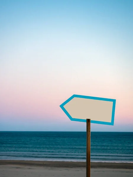 empty sign with space to write on the beach