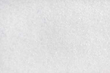 Temiz, beyaz kar yakın plan. Kış dönemi. Kar yüzeyi. Taze pofuduk kar dokusu. Beyaz kar taneleri. Yüksek kalite fotoğraf