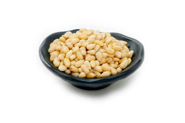 Pine Nuts Black Bowl Isolated White Background — Stock Photo, Image