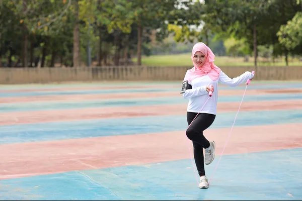 Athletic Young Asian Woman Muslim Sportswear Standing Skipping Rope Outdoor — Stock Photo, Image