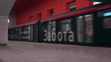 Moscow Russia - January 2022: A modern subway train arrives at the station.