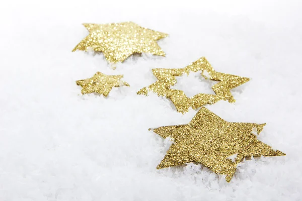 Золотые рождественские звезды — стоковое фото