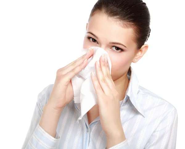 Sick woman blowing her nose — Stock Photo, Image