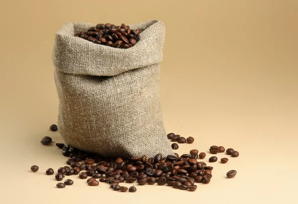 Coffee beans spilled out of the bag — Stock Photo, Image