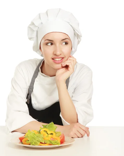 Pretty cook chief holding salad — Stock Photo, Image