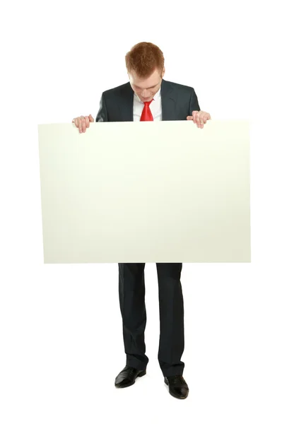 A business man with an empty blank — Stock Photo, Image