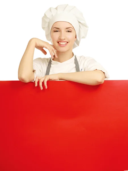 Chef mujer sosteniendo un tablero en blanco — Foto de Stock