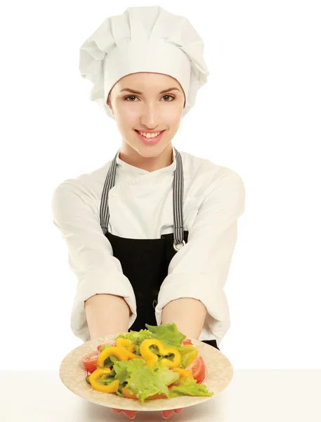 Jolie chef cuisinier tenant la salade — Photo