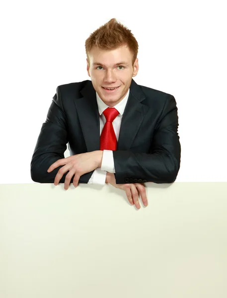 A business man with an empty blank — Stock Photo, Image