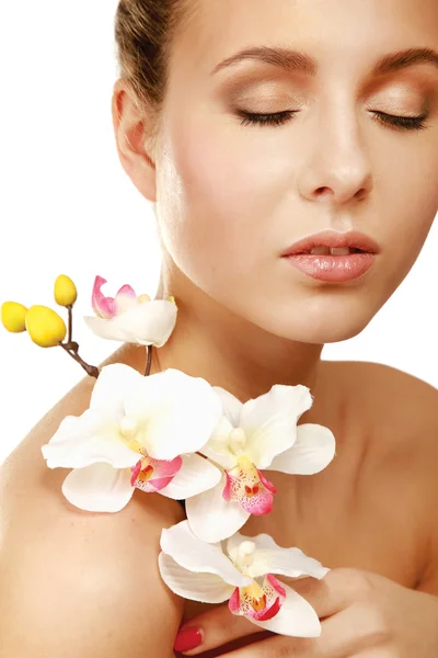 A young woman with orchid — Stock Photo, Image