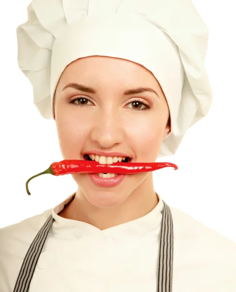 Yound pretty woman cook with pepper Royalty Free Stock Photos