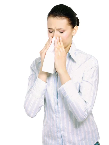 Woman blowing her nose — Stock Photo, Image