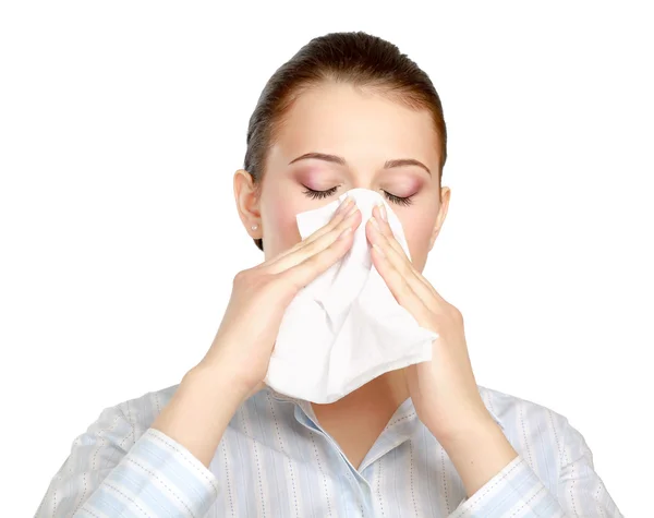 Woman blowing her nose — Stock Photo, Image