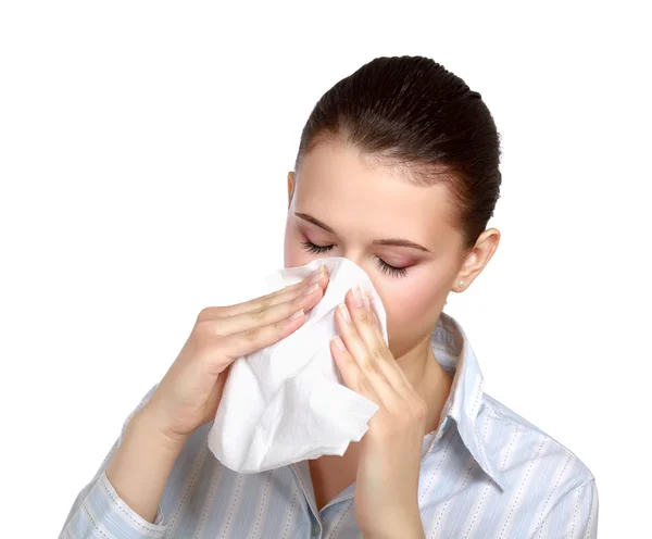 Woman blowing her nose — Stock Photo, Image