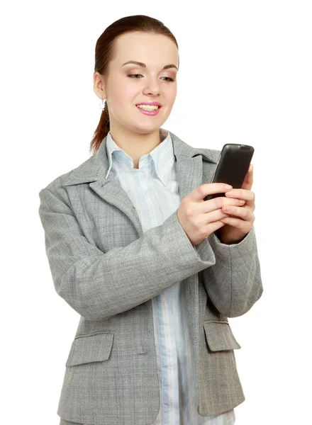 Красивая женщина с телефоном в руке — стоковое фото