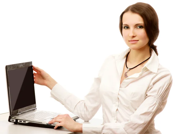 A young woman sitting with a laptop — Stock Photo, Image