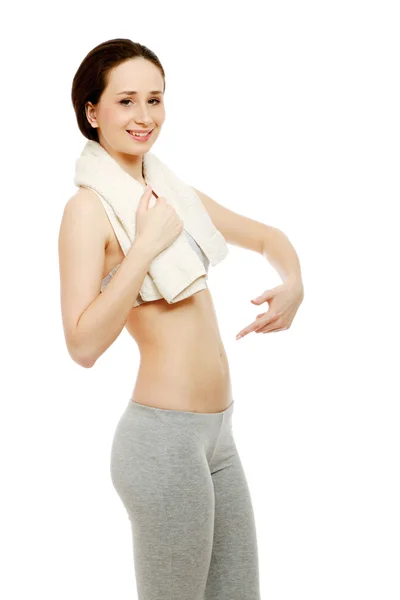 A sportive young woman with a towel — Stock Photo, Image