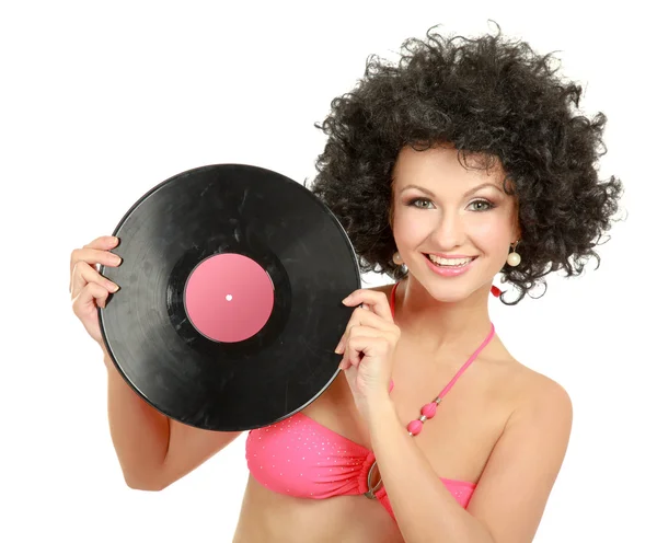 Mulher de biquíni com peruca afro segurando disco de vinil — Fotografia de Stock