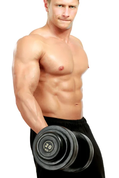 Muskelkräftiger Mann trainiert — Stockfoto