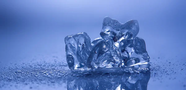 Melting ice on white — Stock Photo, Image