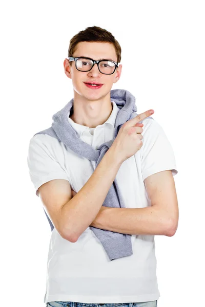 Young man pointing at something — Stock Photo, Image