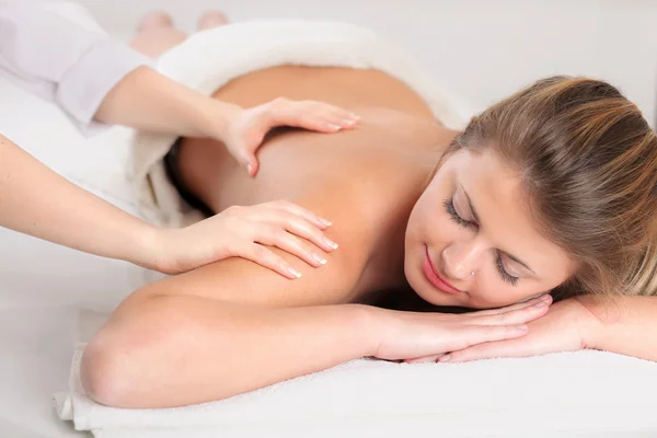 Woman receiving massage — Stock Photo, Image