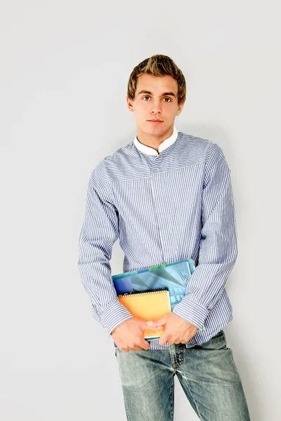 A young college guy with books — Stock Photo, Image