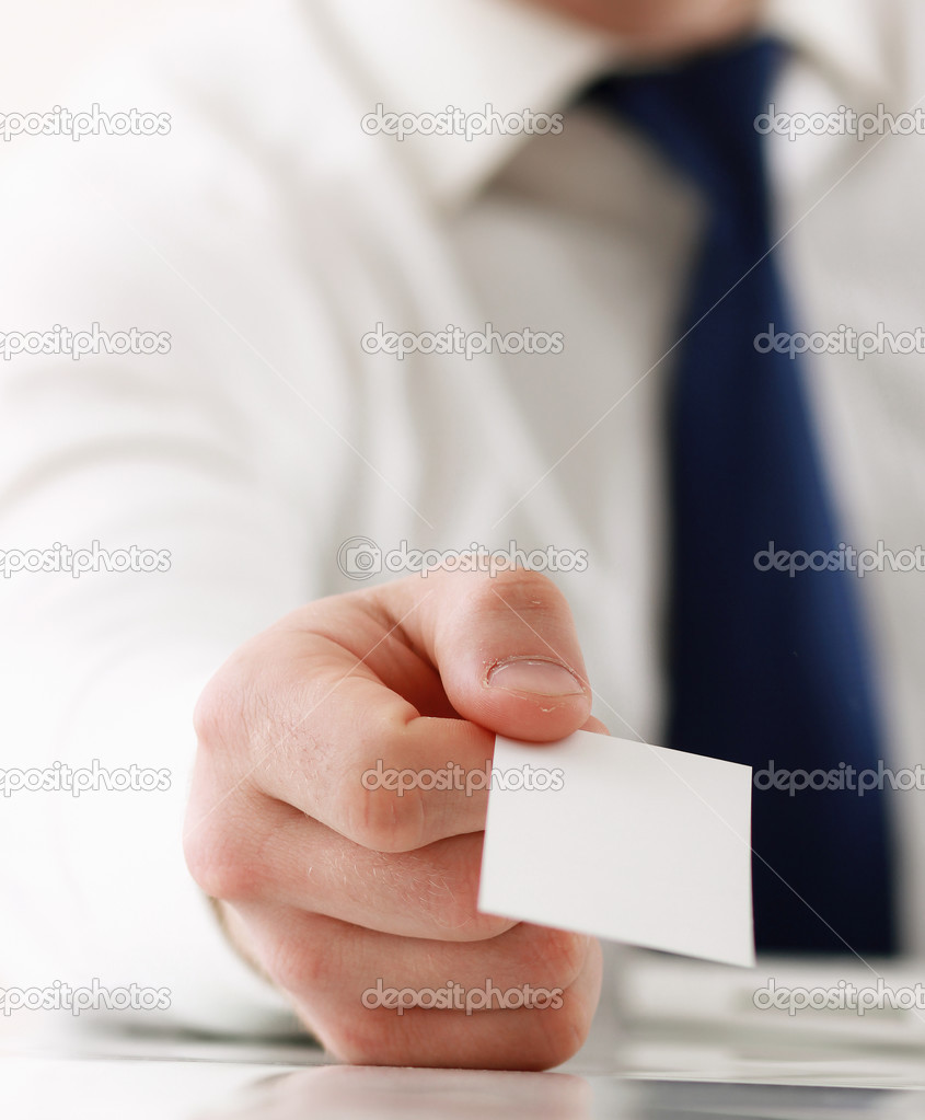 business man holding blank white business card