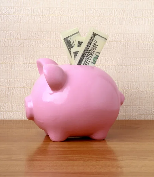 Piggy bank on the desk — Stock Photo, Image