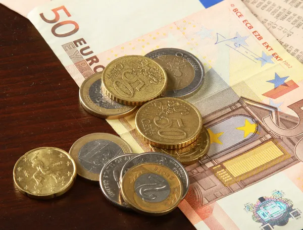 Money: euro coins and bills — Stock Photo, Image