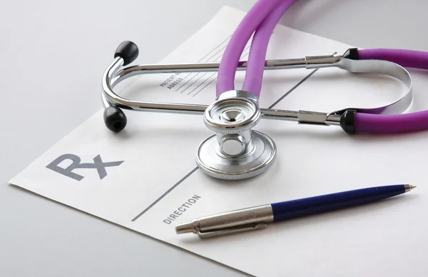 Closeup of a stethoscope on a rx prescription — Stock Photo, Image