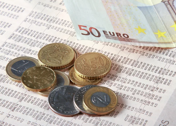 Money: euro coins and bills close up — Stock Photo, Image